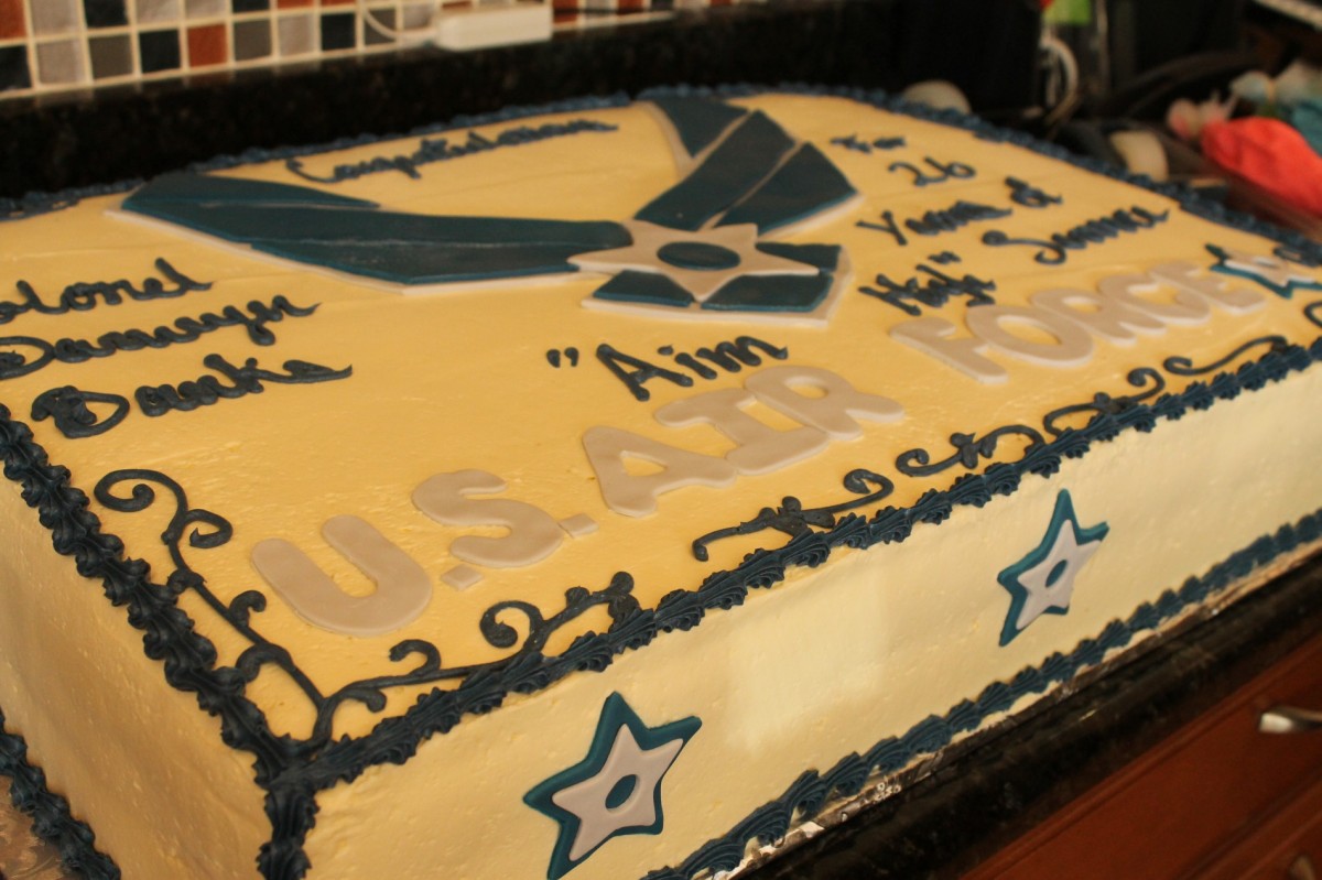 A sheet cake with the U.S. Air Force logo sits on top of a table during the  Joint Task Force-Space Defense's celebration of the U.S. Air Force's 75th  anniversary at Schriever Space